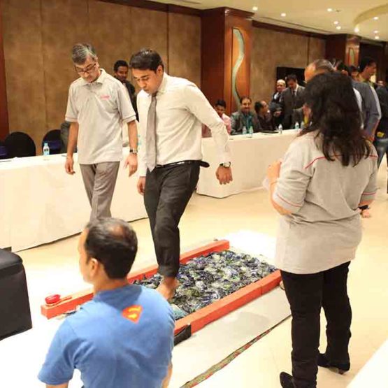 Motivational Exercise | glass walking at Sales & Distributor meets planned by Pegasus Events Pvt Ltd